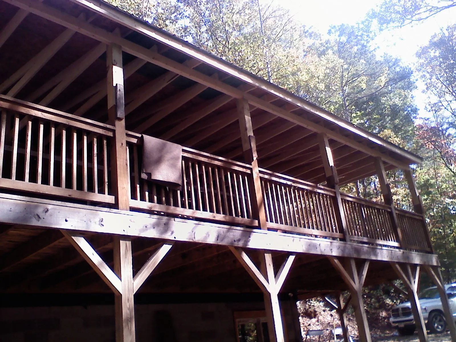 Timber framing under a new elevated porch and deck — Roof Leak Repair in Greenlawn by Roofing Brothers